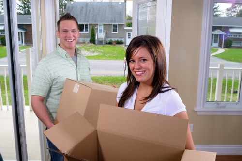 Moving boxes and student furniture during a Crystal Palace relocation