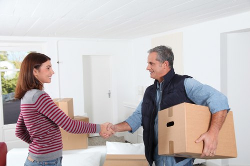 Packed moving boxes and furniture prepared for collection in Crystal Palace
