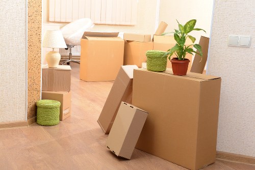 Professional movers handling fragile items during a Crystal Palace relocation