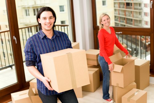 Packed moving boxes and furniture ready for transport in Crystal Palace